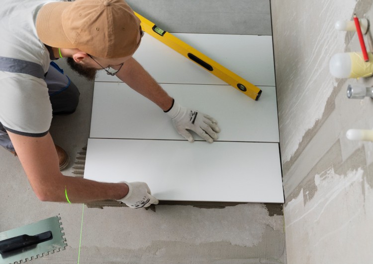 tiler working for shower tile installation