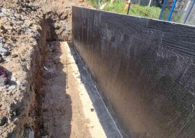 Waterproofing process for a retaining wall before construction begins