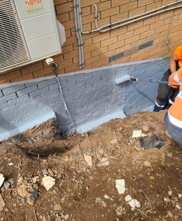 Negative side basement waterproofing